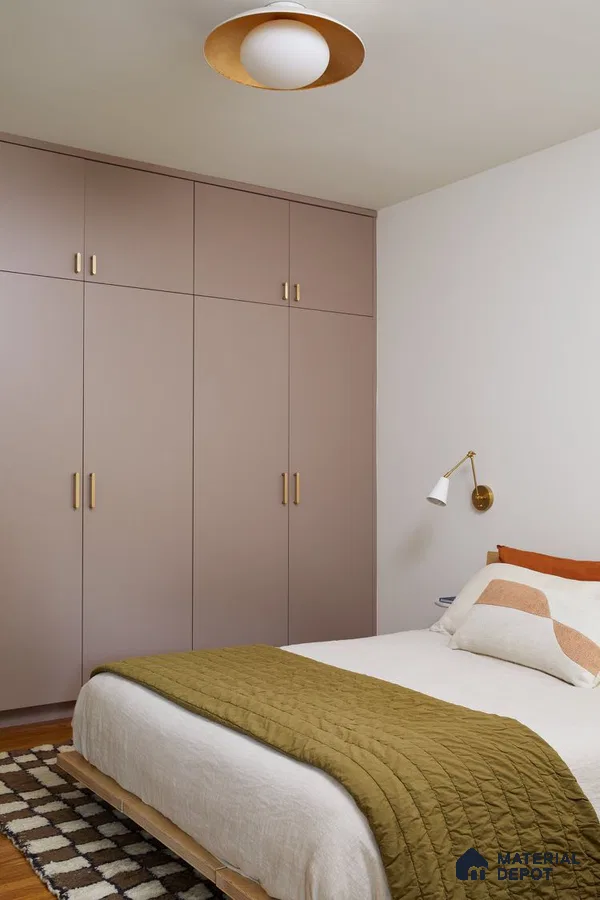 Minimalist bedroom with taupe matte laminate wardrobe and light wood bed frame | Material Depot