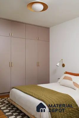 Minimalist bedroom with taupe matte laminate wardrobe and light wood bed frame | Material Depot