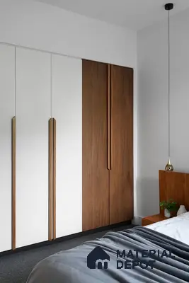 Minimalist bedroom with white and walnut brown laminate wardrobe and grey carpet flooring | Material Depot