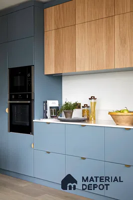 Minimalist blue kitchen with light wood accent cabinets | Material Depot