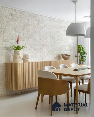Minimalist Dining Space with Stone Cladding Wall and Fluted Console in 2BHK NCC Maple Heights, Whitefield | Material Depot
