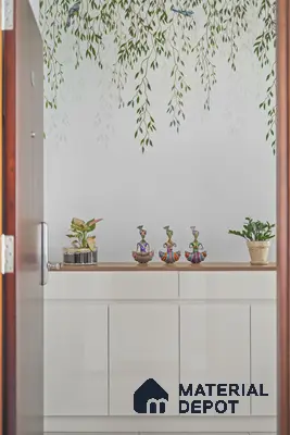 Minimalist foyer with frosty white laminate cabinet, wood top, and botanical wallpaper of 2 BHK in Purva Palm Beach Hennur Bengaluru | Material Depot