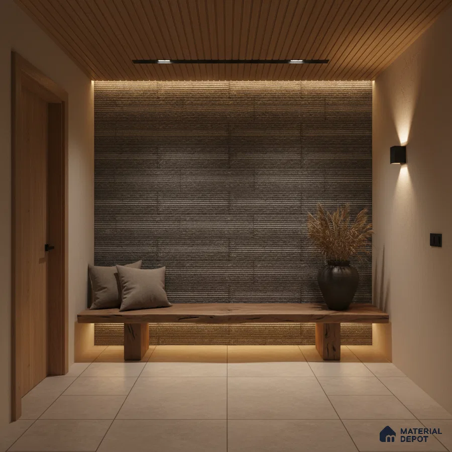 Minimalist foyer with textured grey wall panels, natural wood bench, and beige floor tiles in Bengaluru