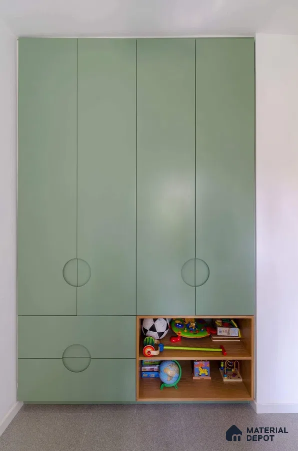 Minimalist kids room wardrobe with sage green laminate and open wooden shelving | Material Depot