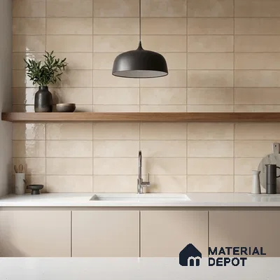 Minimalist kitchen with beige subway wall tiles, matte taupe laminate cabinets, and white quartz countertop