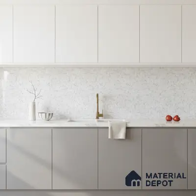 Minimalist kitchen with frosty white and light grey laminate, marble-look quartz countertop, and mosaic backsplash tile in Bengaluru