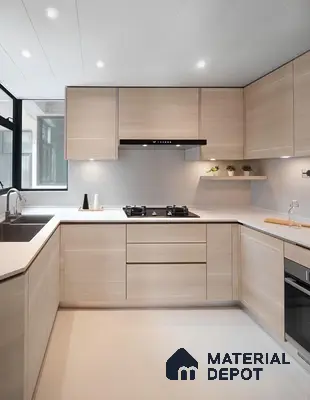 Minimalist kitchen with light beige wood laminate cabinets and white quartz countertop in Bengaluru | Material Depot