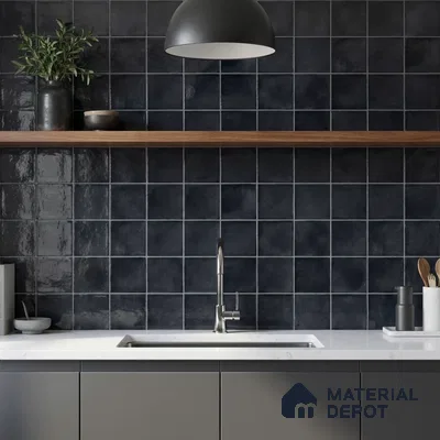 Minimalist kitchen with matte black square wall tiles and white quartz countertop