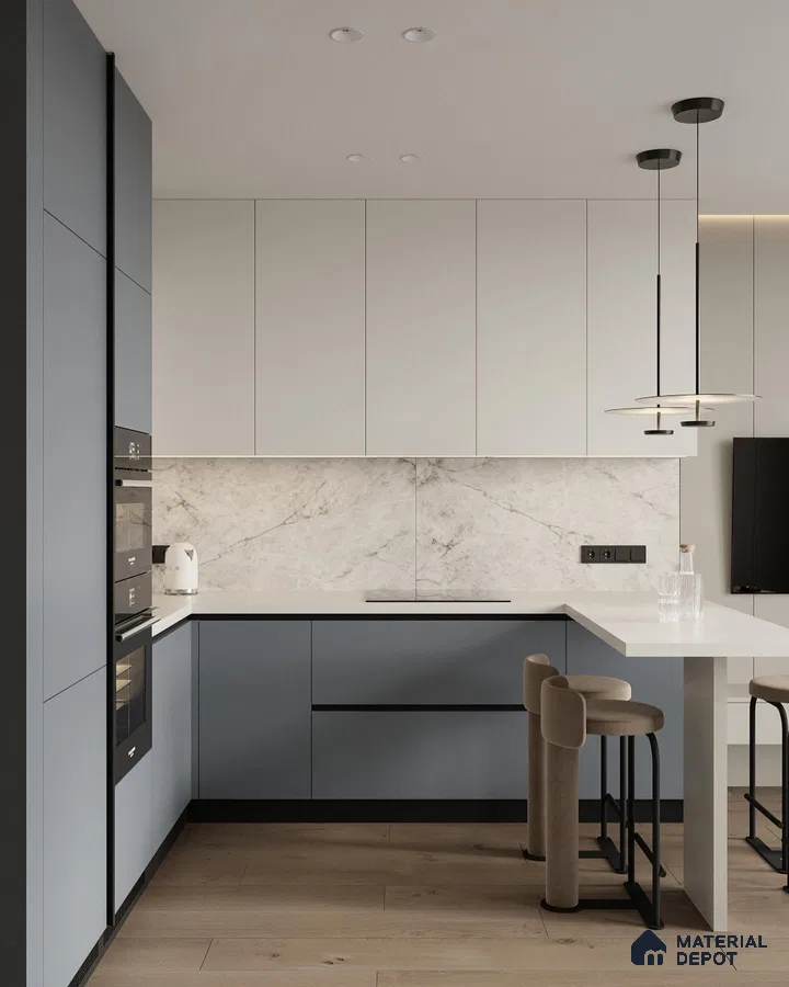 Minimalist kitchen with matte blue and white laminate, marble-look backsplash, and light oak wooden flooring in Bengaluru | Material Depot