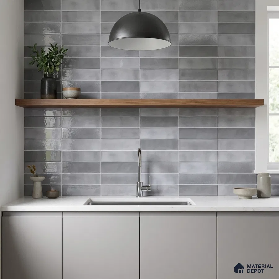 Minimalist kitchen with matte grey subway wall tiles and white quartz countertop