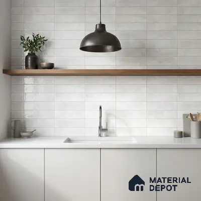 Minimalist kitchen with matte white laminate cabinets, white subway wall tiles, and white quartz countertop