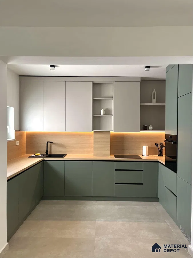 Minimalist kitchen with sage green and frosty white laminate, light wood backsplash, and beige floor tile in Bengaluru | Material Depot