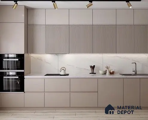 Minimalist kitchen with taupe matte laminate, fluted upper cabinets, and white marble backsplash in Bengaluru | Material Depot