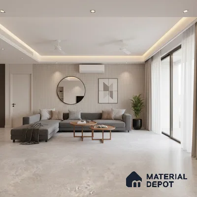 Minimalist living room with grey sectional, beige fluted wall panels, and light stone floor tiles in Bengaluru