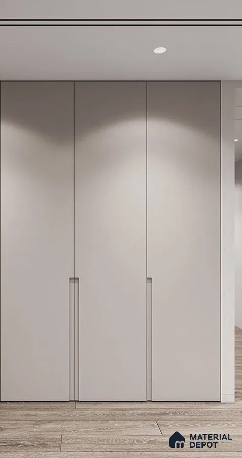 Minimalist wardrobe with frosty white laminate shutters and light oak wooden flooring | Material Depot