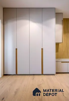 Minimalist wardrobe with frosty white laminate shutters and natural oak wooden flooring | Material Depot