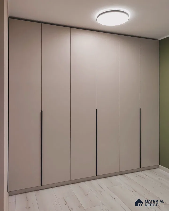 Minimalist wardrobe with matte beige laminate shutters and light wood flooring | Material Depot