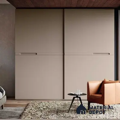 Minimalist wardrobe with matte beige laminate sliding shutters and wooden ceiling accent | Material Depot
