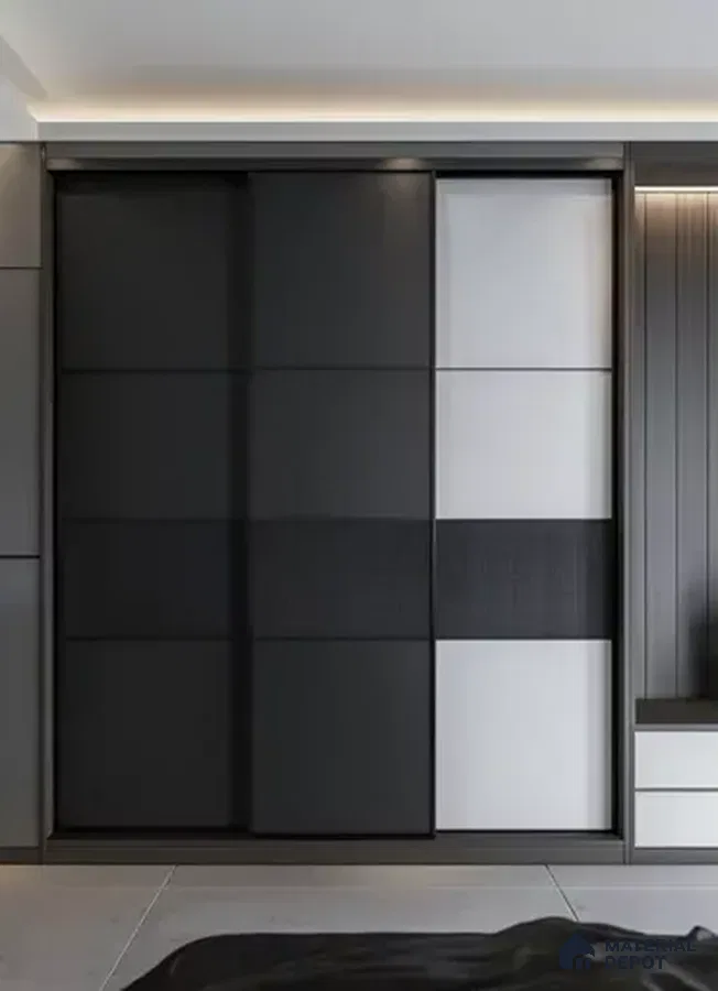Minimalist wardrobe with matte black and frosty white laminate sliding shutters | Material Depot