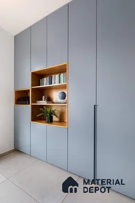 Minimalist wardrobe with matte blue laminate shutters and natural oak open shelves | Material Depot