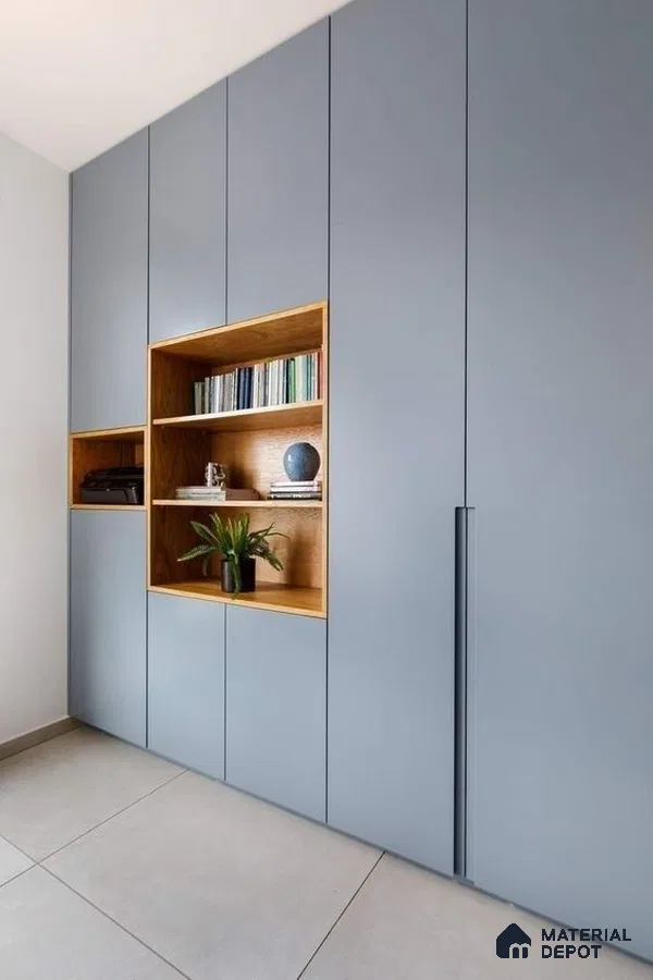 Minimalist wardrobe with matte blue laminate shutters and natural oak open shelves | Material Depot