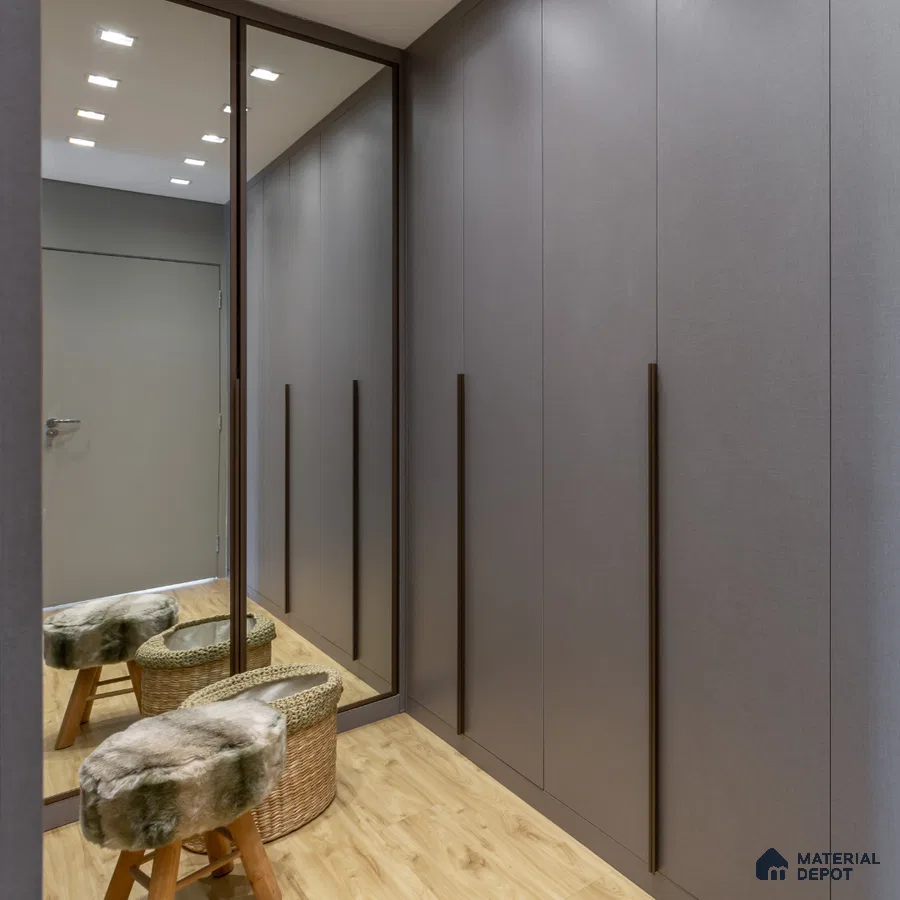 Minimalist wardrobe with matte grey laminate shutters and light oak wooden flooring | Material Depot