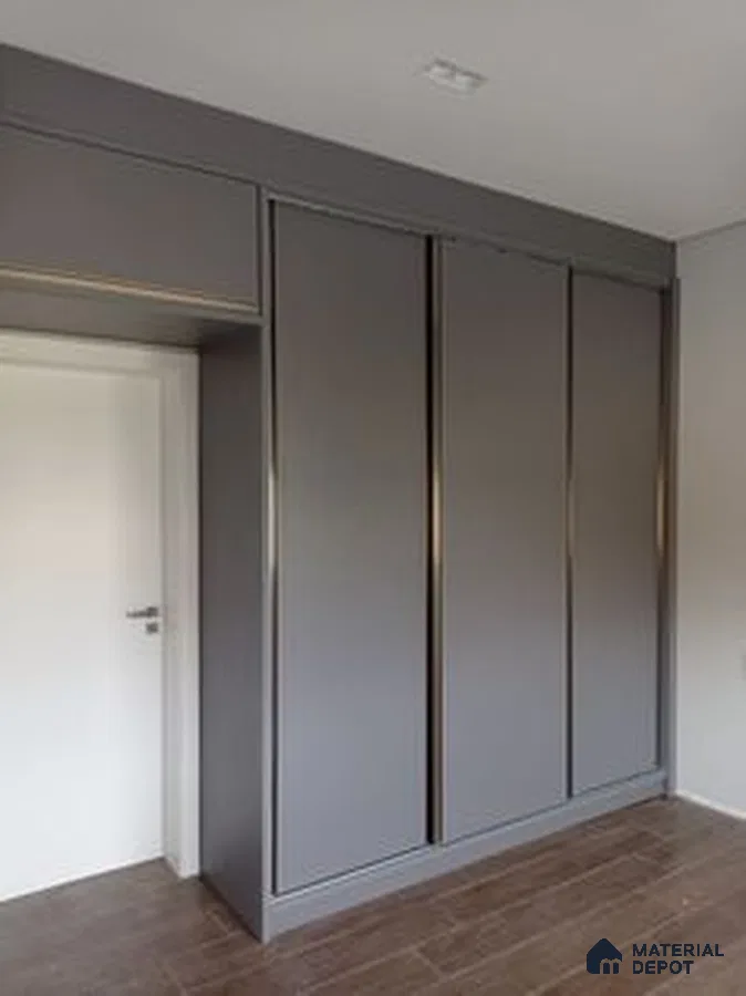 Minimalist wardrobe with matte grey laminate shutters and wood-look floor tile | Material Depot