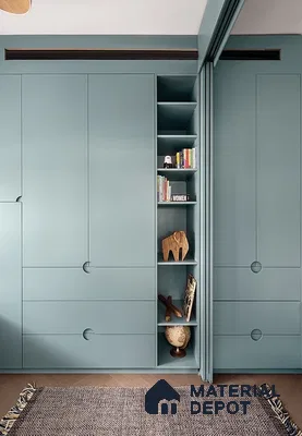 Minimalist wardrobe with matte pastel blue laminate and integrated open shelving | Material Depot