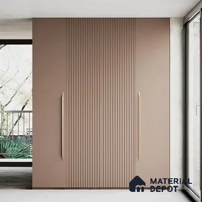 Minimalist wardrobe with matte taupe fluted laminate shutters and long gold handles | Material Depot