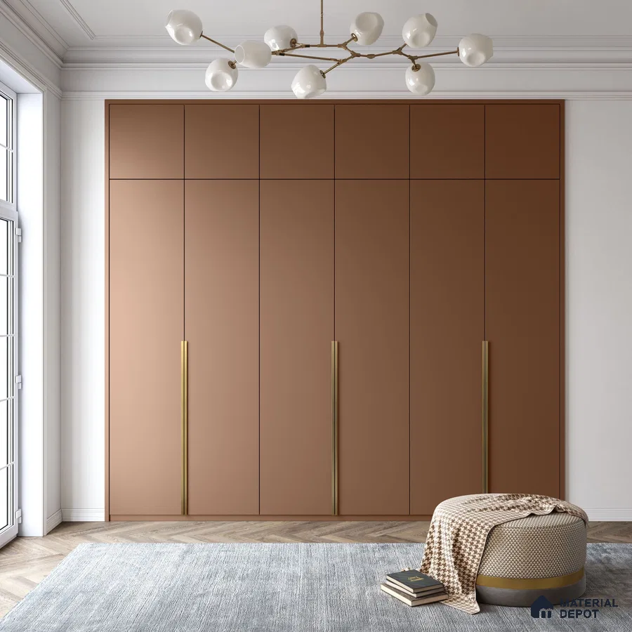 Minimalist wardrobe with matte terracotta laminate shutters and brass handles in bedroom | Material Depot