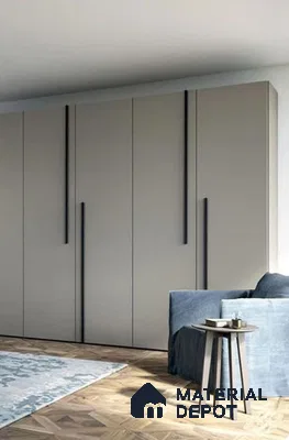 Minimalist wardrobe with taupe matte laminate shutters and herringbone wood flooring | Material Depot