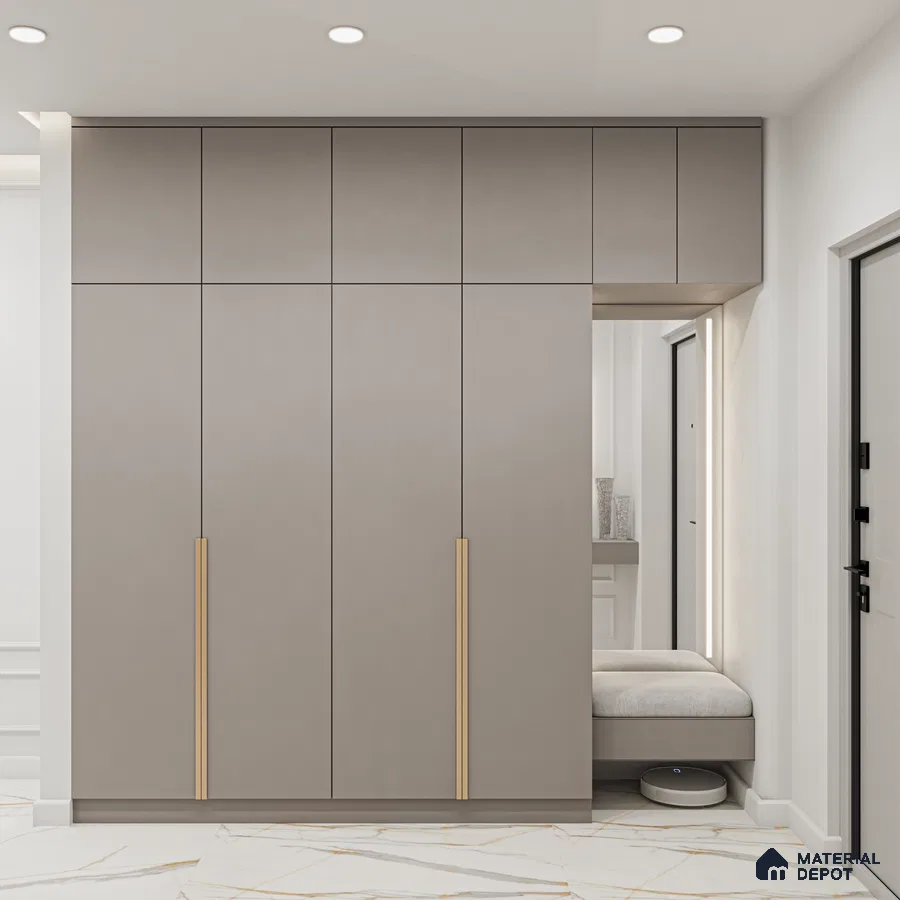 Minimalist Wardrobe with taupe matte laminate wardrobe, gold handles, and white marble floor tile | Material Depot