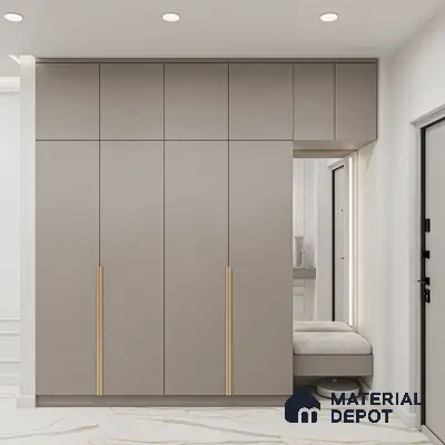 Minimalist Wardrobe with taupe matte laminate wardrobe, gold handles, and white marble floor tile | Material Depot