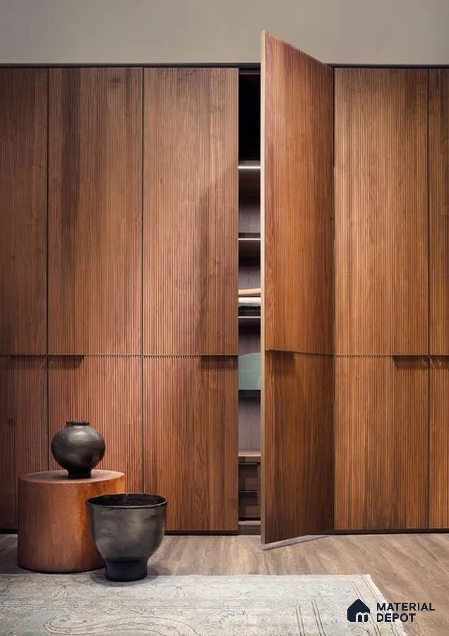 Minimalist wardrobe with walnut brown fluted wooden laminate and wood flooring | Material Depot