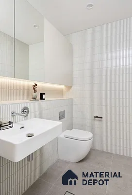 Minimalist White Bathroom with Vertical Tile Accents and Floating Fixtures | Material Depot