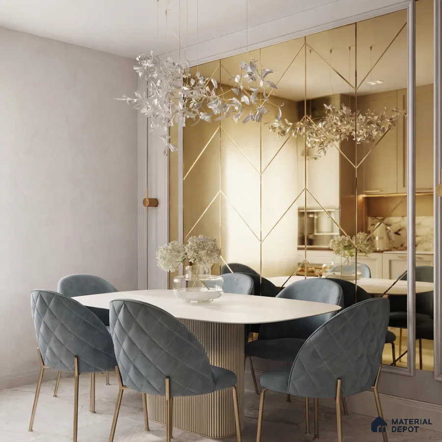 Modern dining room with gold-accented mirror wall, white marble table, and blue velvet chairs