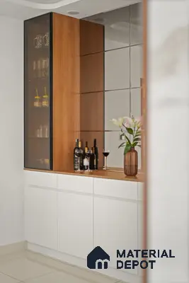 Modern bar unit with white laminate base cabinets, walnut wood laminate, and mirrored wall panels of 2 BHK in Purva Palm Beach Hennur Bengaluru | Material Depot