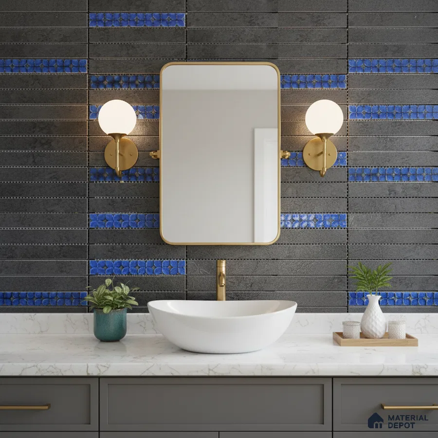 Modern bathroom with black and blue patterned wall tiles and white marble countertop