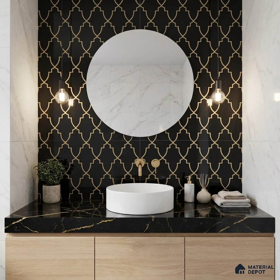 Modern bathroom with black and gold geometric wall tile, black marble countertop, and light wood vanity