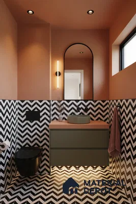 Modern bathroom with black-and-white chevron tiles, olive green vanity, and terracotta countertop in Bengaluru | Material Depot