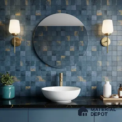 Modern bathroom with blue and gold square mosaic wall tiles and black marble countertop