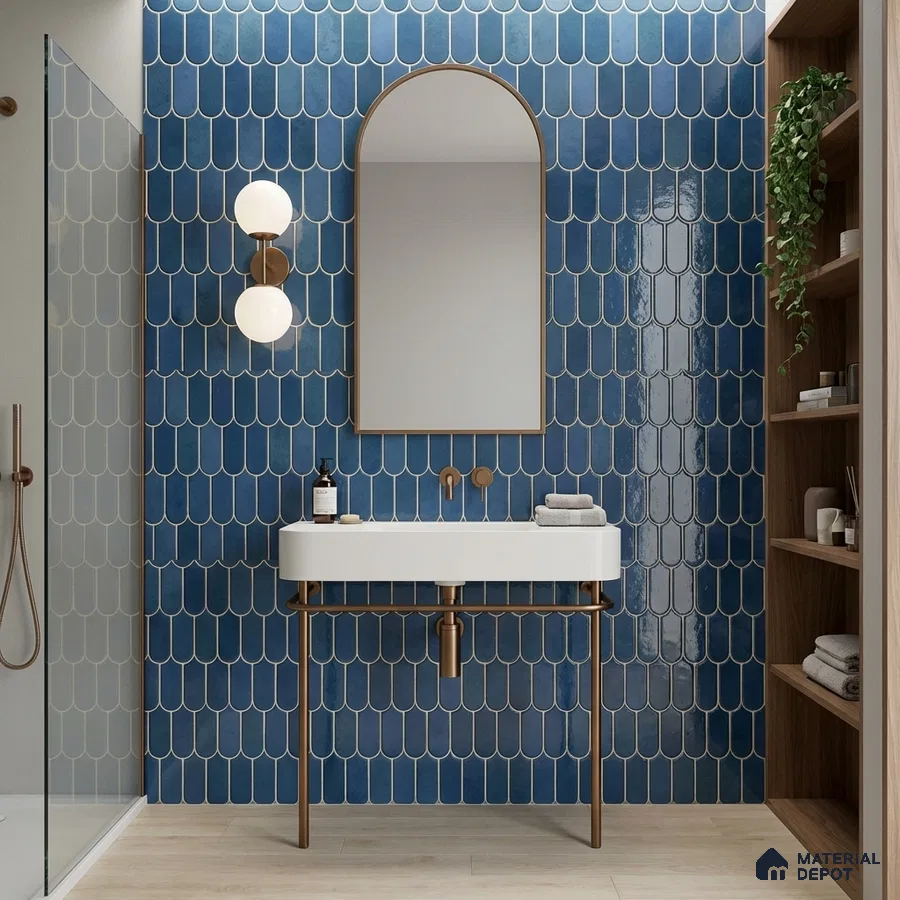 Modern bathroom with blue fishscale wall tiles and light wood floor