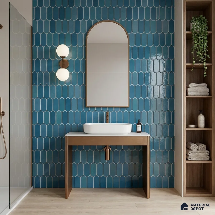 Modern bathroom with blue fishscale wall tiles and light wood vanity