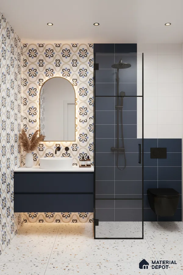 Modern bathroom with blue geometric floral wall tiles, navy blue subway tiles, and terrazzo floor tiles in Bengaluru | Material Depot