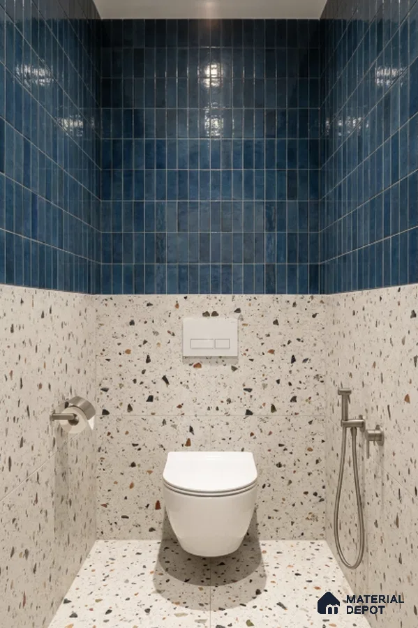 Modern bathroom with blue kitkat wall tiles and terrazzo floor and wall tiles