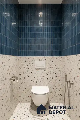 Modern bathroom with blue kitkat wall tiles and terrazzo floor and wall tiles
