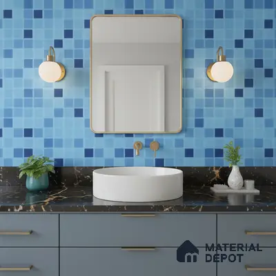 Modern bathroom with blue mosaic wall tiles and black marble countertop