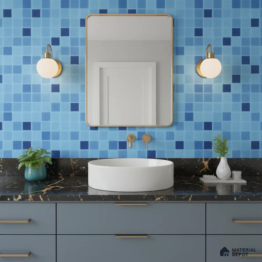 Modern bathroom with blue mosaic wall tiles and black marble countertop