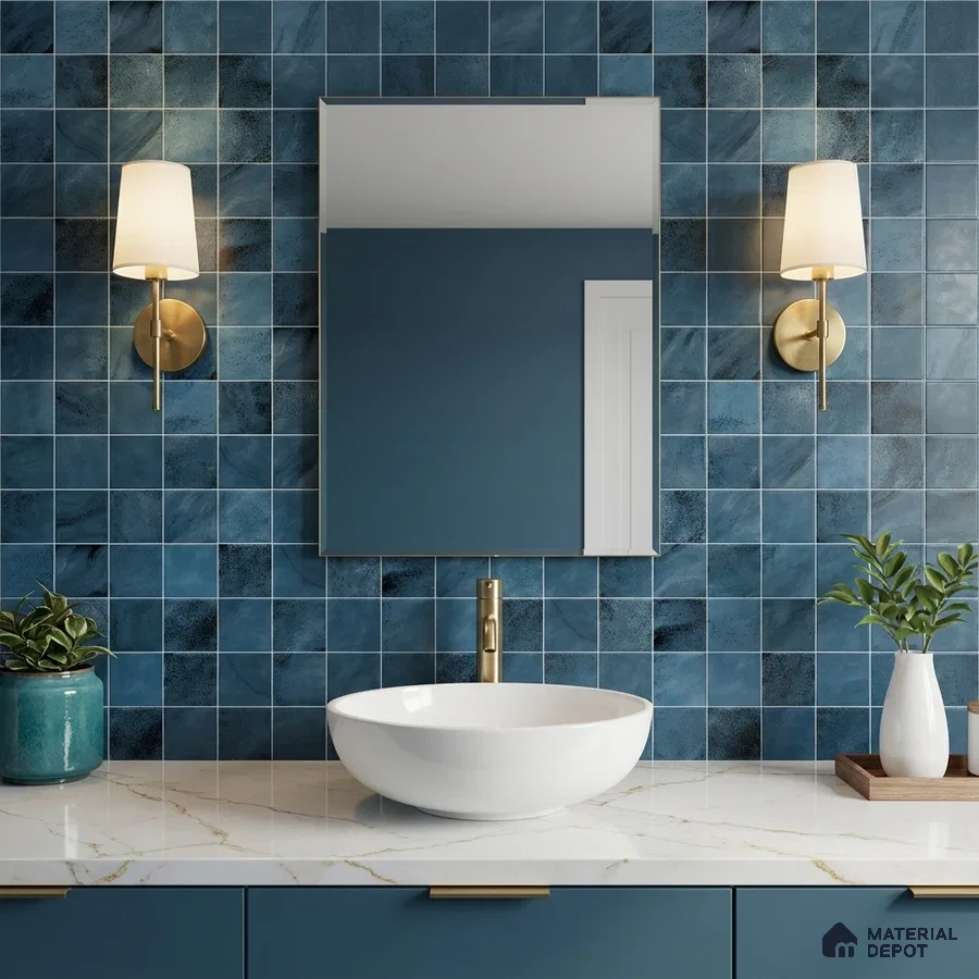 Modern bathroom with blue square wall tiles, white marble countertop, and blue laminate vanity
