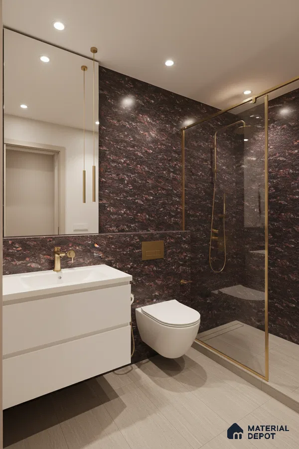 Modern bathroom with dark brown stone-look wall tiles, beige floor tiles, and gold accents | Material Depot